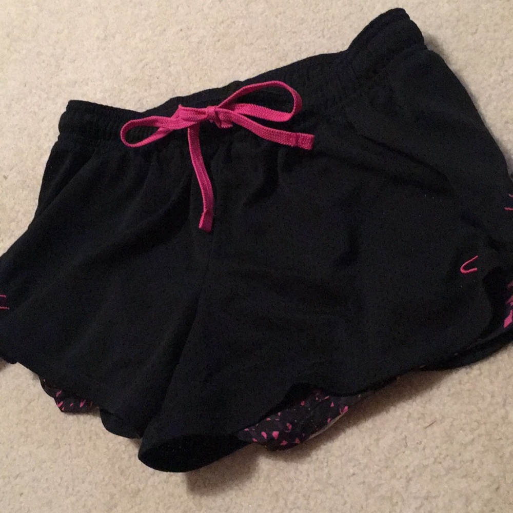 black and pink champion running/sport shorts